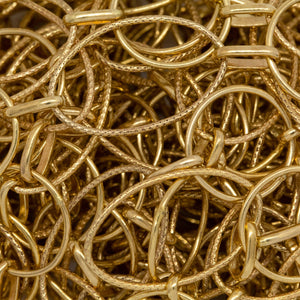 14kt Gold Filled 10.0mm Width by 16.0mm Length Textured Oval Link And 12.0mm Smooth Circle Link Connected by 3.7mm Width by 6.6mm Length Oval Rolo Link, Long and Short Chain. Price per: 1 Foot.