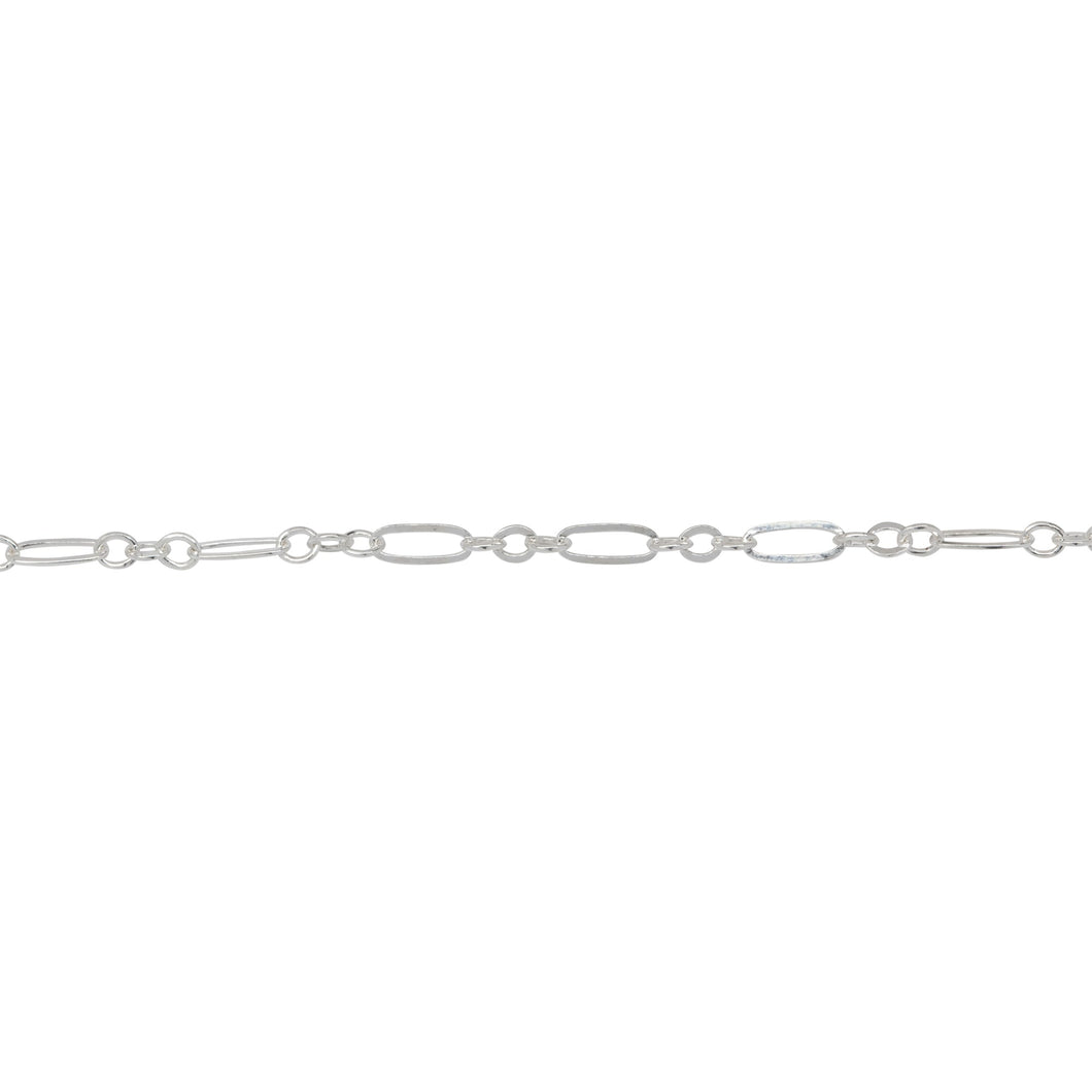 Chain by Foot. Sterling Silver One of 1.8mm Width by 5.0mm Length Flat Elogated Link connected to Three of 1.8mm Width by 2.0mm Length Oval Links with Middle Link being Flat Oval Link, Long and Short Chain. Price per: 1 Foot.