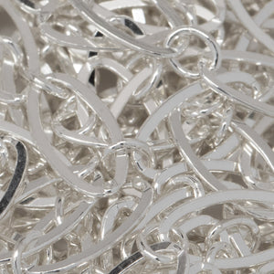 Sterling Silver 2.4mm Width by 2.9mm Length Small Smooth Oval Link Connected to 4.4mm Width by 7.8mm Length Larger Flat Oval Link, Flat Long and Short Chain. Price per: 1 Foot.