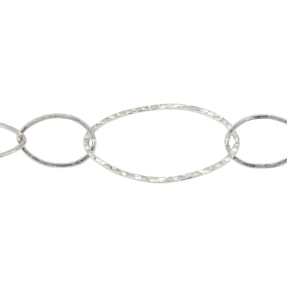 Chain by Foot. Sterling Silver Five of 13.8mm Width by 20.8mm Length Smaller Flat Oval Links Followed by 22.7mm Width by 40.4mm Length Large Hammered Oval Link, Long and Short Chain. Price per: 1 Foot.