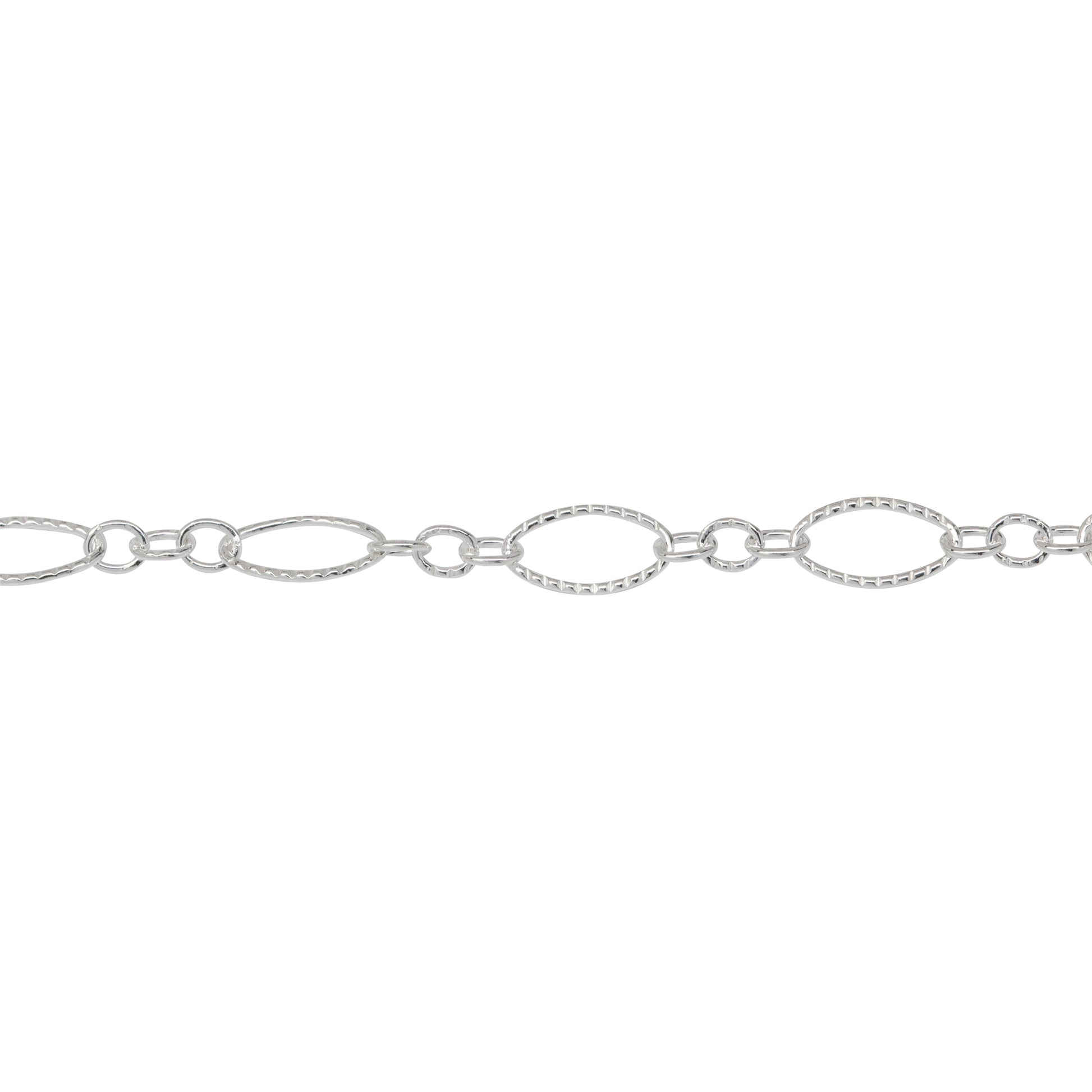 Chain by Foot. Sterling Silver Three of 2.4mm Width by 3.0mm Length Small Oval Links With Middle Small Oval Link being Corrugated One, Followed by 3.9mm Width by 7.8mm Length Large Corrugated Oval Link, Long and Short Chain. Price per: 1 Foot.