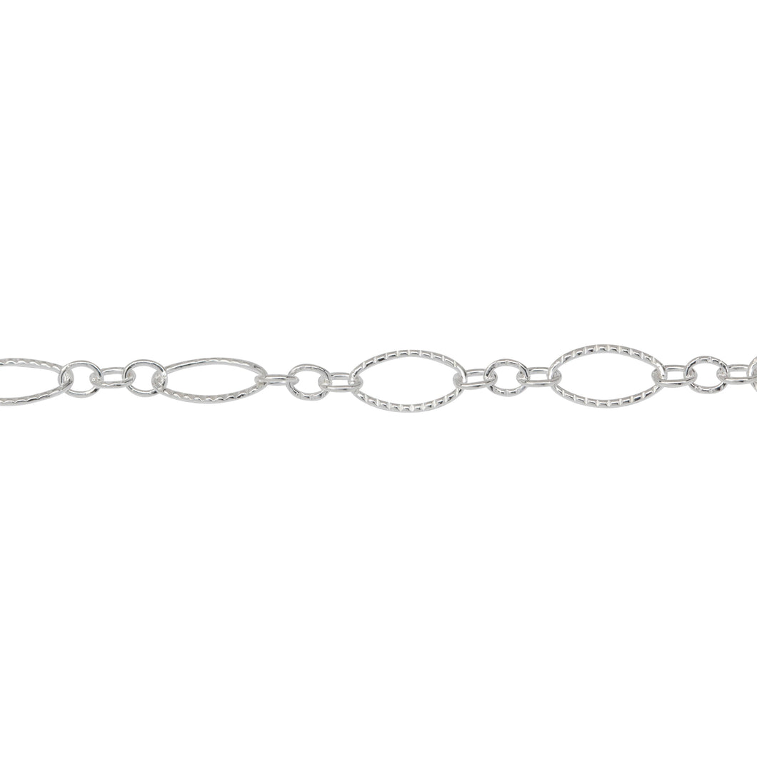Chain by Foot. Sterling Silver Three of 2.4mm Width by 3.0mm Length Small Oval Links With Middle Small Oval Link being Corrugated One, Followed by 3.9mm Width by 7.8mm Length Large Corrugated Oval Link, Long and Short Chain. Price per: 1 Foot.
