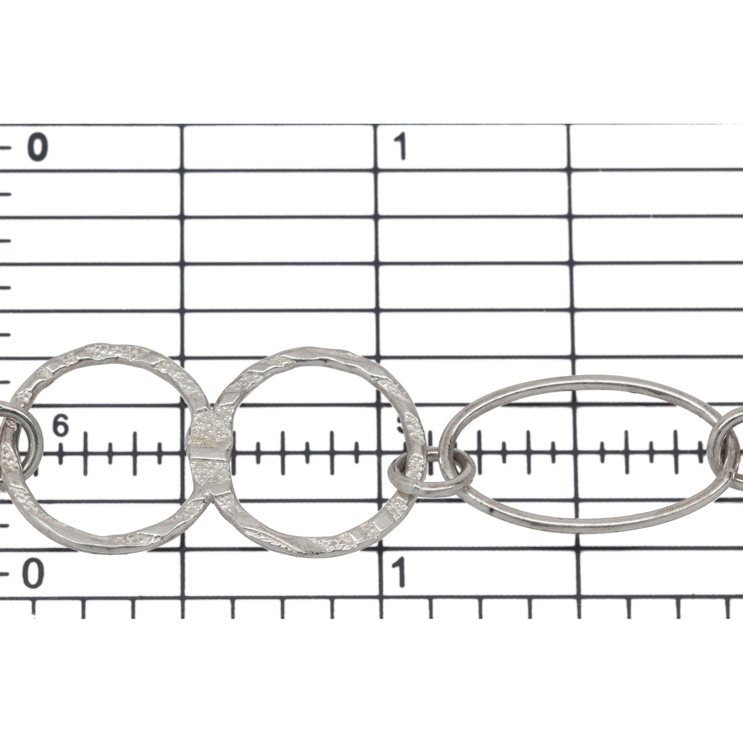Sterling Silver 14.4mm Width by 27.4mm Length Textured Figure 8 Link And 11.7mm Width by 19.7mm Length Smooth Oval Link Connected By 5.4mm Width / Length Smooth Open Ring, Fancy Chain. Price per: 1 Foot.