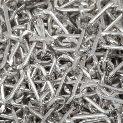 Sterling Silver One of 3.2mm width by 6.3mm length Flat Elongated Oval Link Followed by One of 2.6mm width by 3.1mm length Smaller Smooth Oval Link, Long and Short Chain. Price per: 1 Foot.
