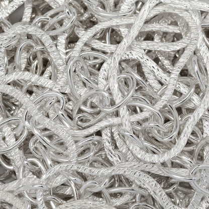 Sterling Silver Ten of 10.5mm width by 6.6mm length, Smooth Oval Cable Links Followed by 23.8 width by 38.7mm length Large Hammered Oval Links, Long and Short Chain. Price per: 1 Inch.