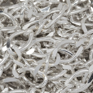 Sterling Silver 6.6mm Width by 9.8mm Length Flat Oval Curb Link Connected To 4.2mm Width by 9.7mm Length Figure 8 Link, Figure 8 Chain. Price per: 1 Foot.