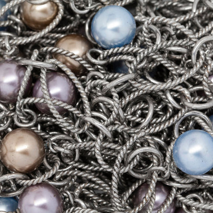 Sterling Silver Rhodium Plated Two of 4.17mm Circle Links Connected with Three of 7.96mm Swarovski Pearls, followed by Four of 8.35mm by 14.67 Twisted Oval Links, 5 Smooth Circle Links & Two Twisted Circle Link, Long & Short Chain. Price per: 1 Inch.