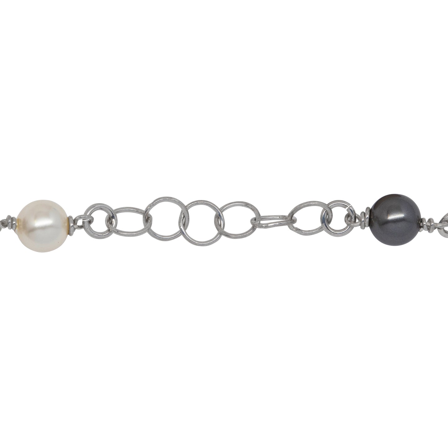 Sterling Silver Rhodium Plated Two of 4.12mm Width / Length Smooth Circle Connected with Two of 6.02mm Width / Length Swarovski Pearls, followed by Six of 5.34mm Width / Length Smooth Circle Links of Circle Chain. Price per: 1 Inch.