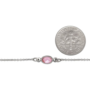 Sterling Silver Rhodium Plated 1.25mm Width by 1.45mm Length Smooth Cable Chain With 5.0mm Width by 6.5mm Length Pink Oval CZ Bezel Set Connected by 3.6mm Width / length Smooth Circle On Each Side, Every 2 Inches, Bezel Set Chain. Price per: 1 Inch.