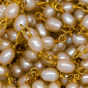 Brass Gold Plated 3.35mm Width by 4.20mm Length White Potato Pearl Chain. Price per: 1 Inch.