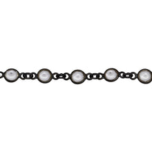 Load image into Gallery viewer, Chain by Foot. Sterling Silver Oxidized 5.7mm Width / Length Crystal Round Bezel Set Connected by 2.87mm Width / Length Smooth Circle On Each Side, Followed by 2.8mm Width by 3.8mm Length Smooth Oval Link, Bezel Set Chain. Price per: 1 Inch.
