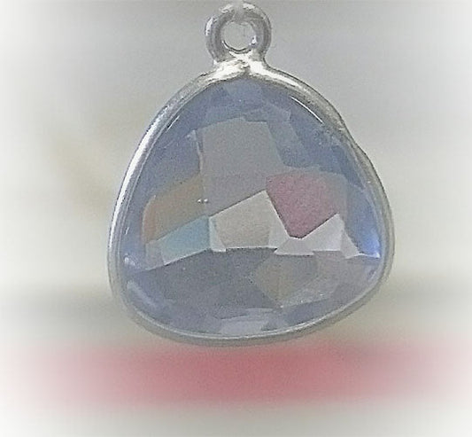 Stone Connectors & Drops. Sterling Silver 13.0mm Width by 19.3mm Length, Topaz Stone, Triangle Drop with one 3.0mm Closed Ring. Quantity Per Pack: 1 Piece.