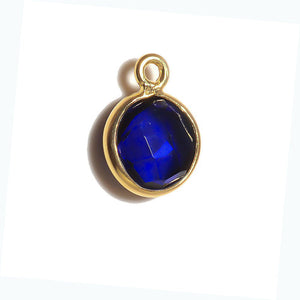 Stone Connectors & Drops. Sterling Silver Gold Plated / Vermeil 8.0mm Width / Length, Sapphire Stone, Round Drop with one 3.3mm Closed Ring. Quantity Per Pack: 1 Piece.