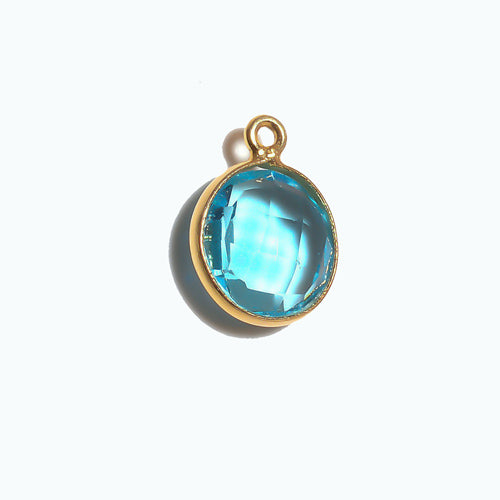 Stone Connectors & Drops. Sterling Silver Gold Plated / Vermeil 11.0mm Width / Length, Blue Topaz Stone, Round Drop with one 3.3mm Closed Ring. Quantity Per Pack: 1 Piece.