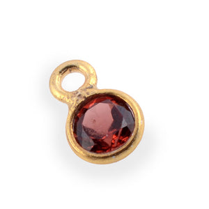 Stone Connectors & Drops. Sterling Silver Gold Plated / Vermeil 3.0mm Width / Length, Garnet Stone, Round Drop with one 2.2mm Closed Ring. Quantity Per Pack: 1 Piece.