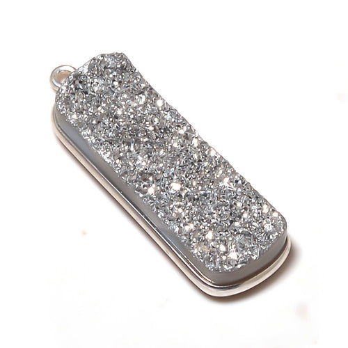 Stone Connectors & Drops. Sterling Silver 10.2mm Width by 33.8mm Length, Druzy - Silver Stone, Rectangle Drop with one 3.1mm Closed Ring. Quantity Per Pack: 1 Piece.