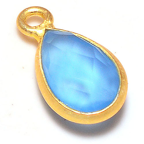 Stone Connectors & Drops. Sterling Silver Gold Plated / Vermeil 9.3mm Width by 15.9mm Length, Swiss Blue Topaz Quartz Stone, Tear Drop, Drop with one 3.3mm Closed Ring. Quantity Per Pack: 1 Piece.