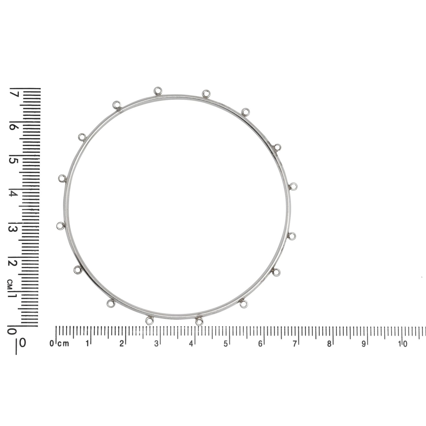 Sterling Silver 66.30mm Width / Length Smooth Bangle with 16 of 2.45mm Width / Length Smooth Fix Ring on outside of the Bangle. Quantity Per Pack: 1 Piece.